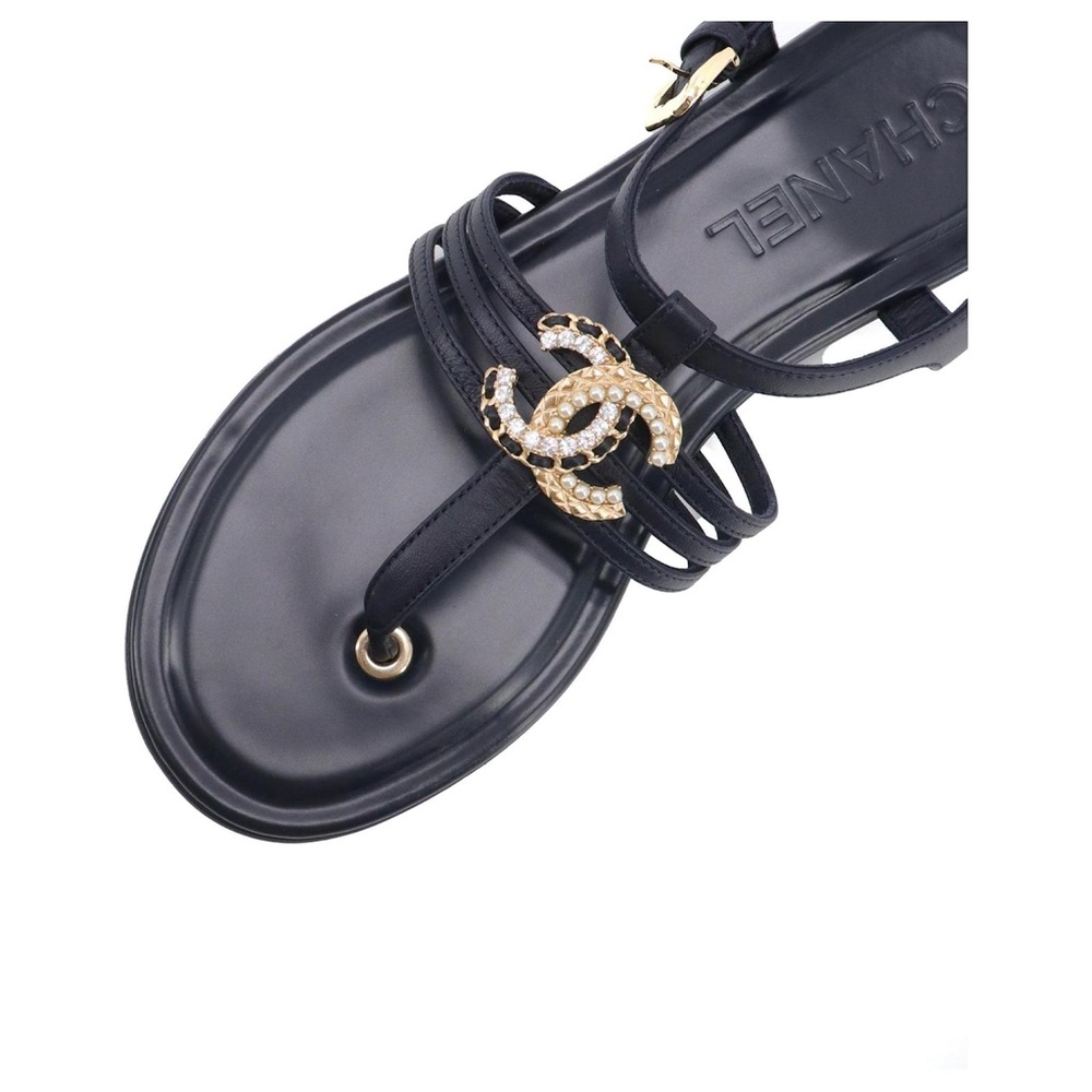 CHANEL Black Sandals with Gold Accents